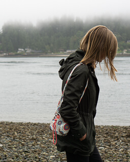 Ashley on a shore in the Pacific Northwest